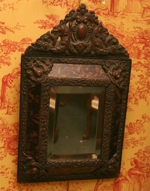 FLEMISH TORTUS AND REPOUSSE' BRASS MIRROR
