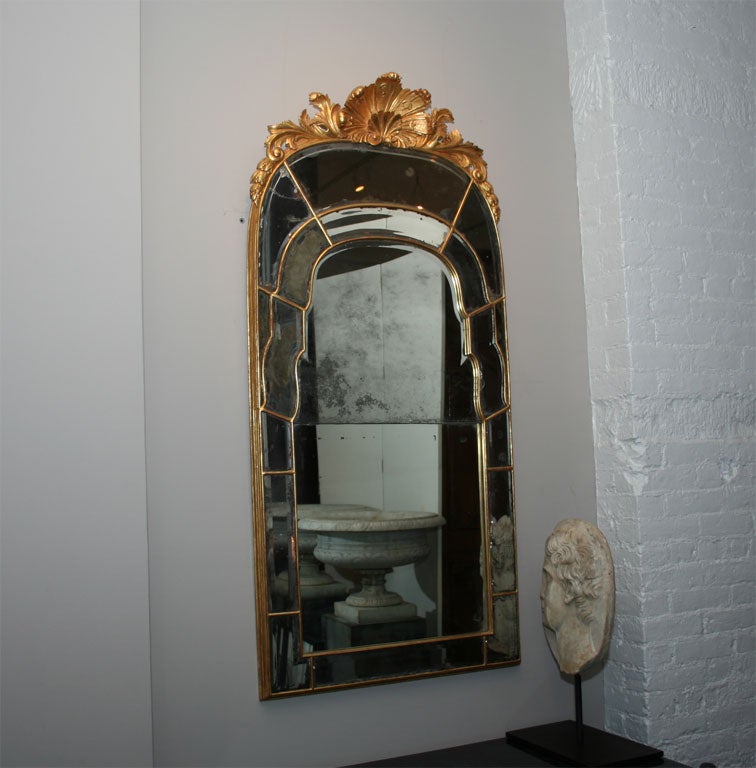 Tall mirror, decorative and good period example. Original mirror intact.