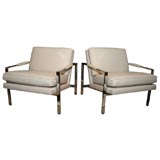 Pair of leather lounge chairs by Milo Baughman