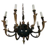 Patinated green and gilt 8 light chandelier