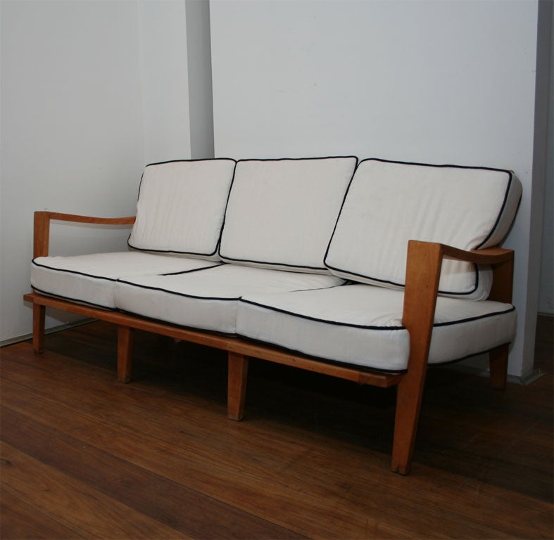 One three seat sofa by Leslie Diamond for Conant-Ball (usually attributed to Russell Wright). In natural maple wood with his typical design style of the period.Metal springs supports the lose cushions seats.Stamped by maker.