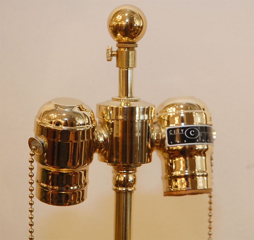 Pair of gold leaf baluster form table lamps by City Studio 1