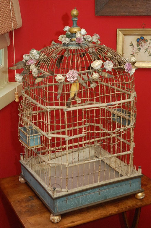 Charming  antique bird cage  with porcelaine flowers   original paint drawer  and 2 feeders