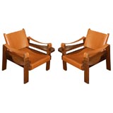 Pair of low leather armchairs in the style of Sergio Rodriguez