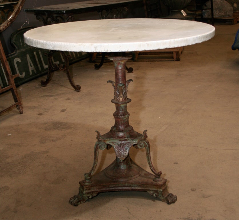 Cast iron and marble top table
