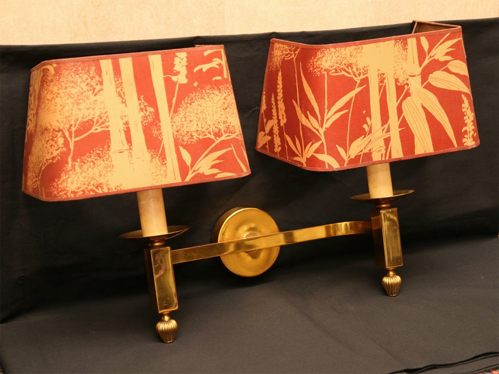 Double-armed pair of wall sconces, brass with tropical motif fabric shades, French, circa 1940s, rewired for US use.