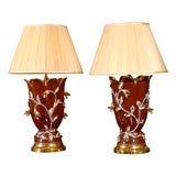 Pair of sang-de-boeuf floral urns as lamps