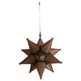 A Pressed Glass Star Formed Ceiling FIxture.