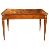 A Louis XVI Ormolu Mounted Tulipwood Parquetry Tric-Trac Table