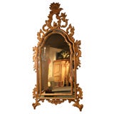 A Carved and Gilded Italian Rococo Style Mirror