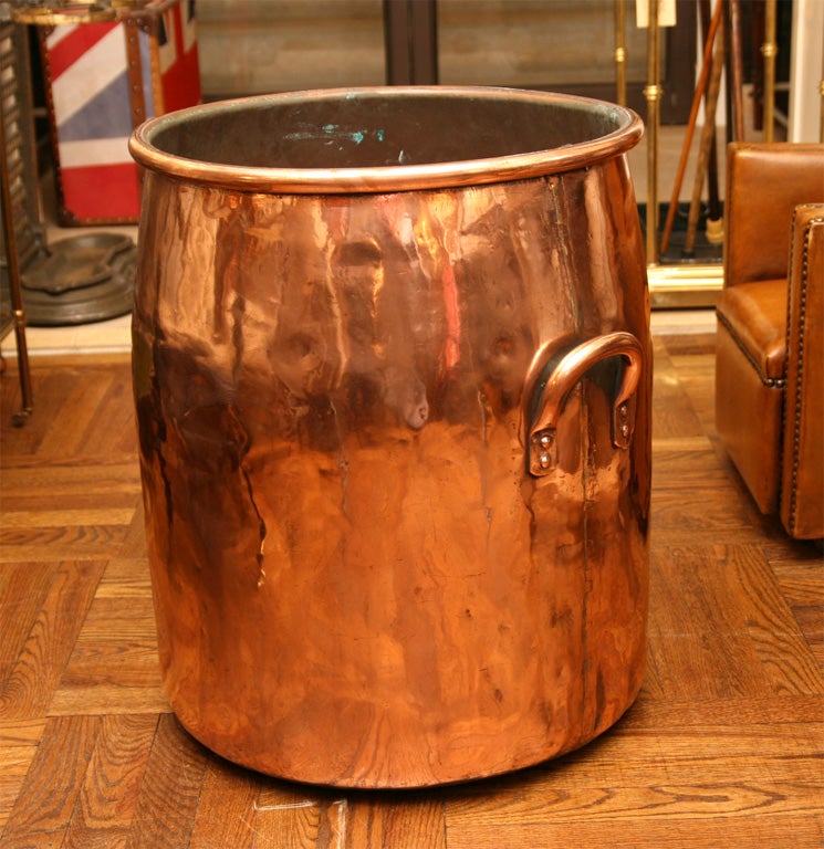 Large Copper Log Bin or Umbrella Stand with Two Handles. England, 19th Century.<br />
<br />
23.5 inches high x 20 inches diameter