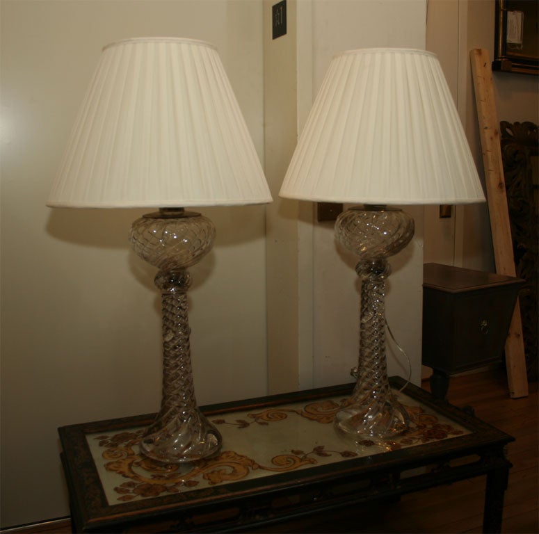 A pair of French Baccarat crystal table lamps