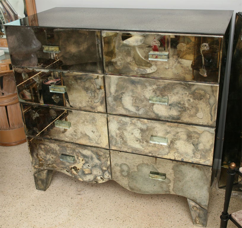 This 1940's chest of drawers is BIG...but the curved apron and fabulously distressed mirror assure that it's beautiful too. You simply cannot fake the wonderful aging on this piece, (and we love it), but it's definitely NOT for the faint of heart,