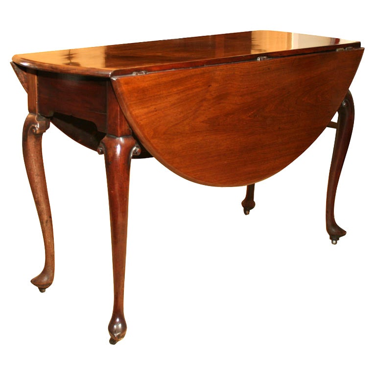 George II. mahogany oval drop-leaf table