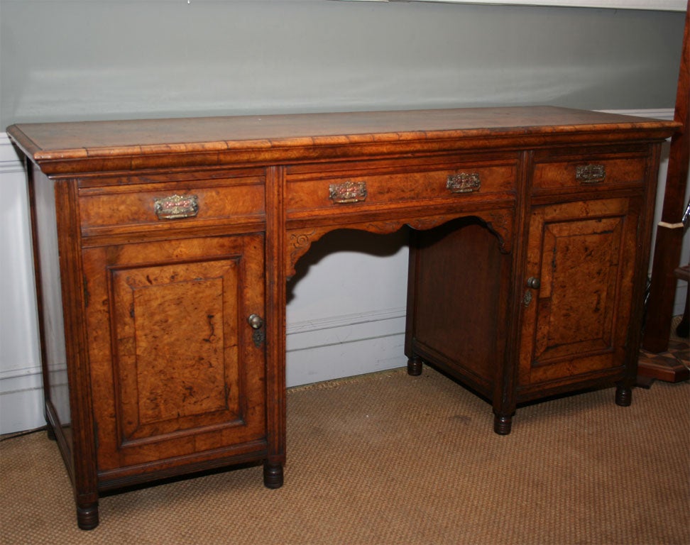 English early 20th century extremely high quality Arts & Crafts designer-made sideboard, top with molded edge, all surfaces including edges veneered in burl wood, three drawers over two cabinets with all original period hand-hammered copper and