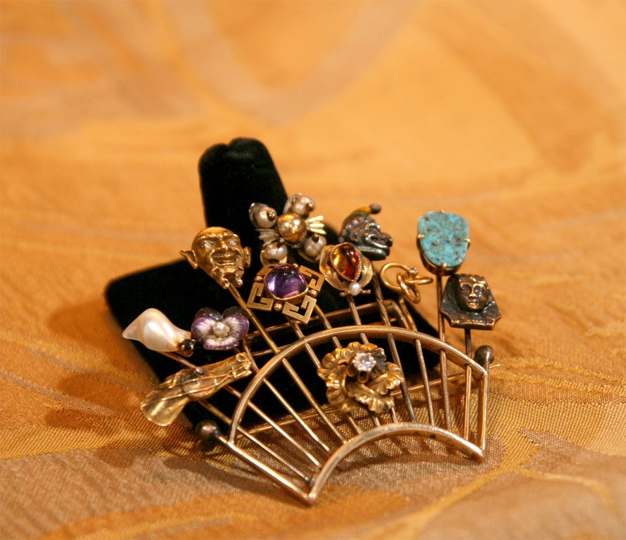 12 antique gold stick pins-with diamonds, peal and various stones made into pin.