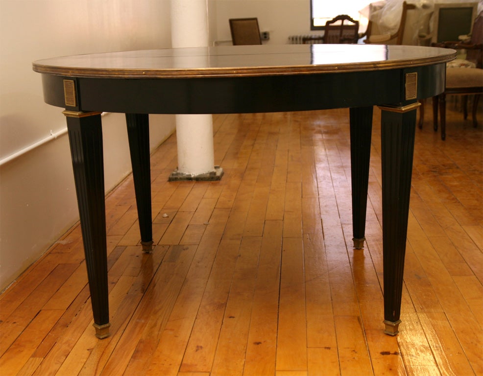 Ebonized & Gilt circular Dining Table