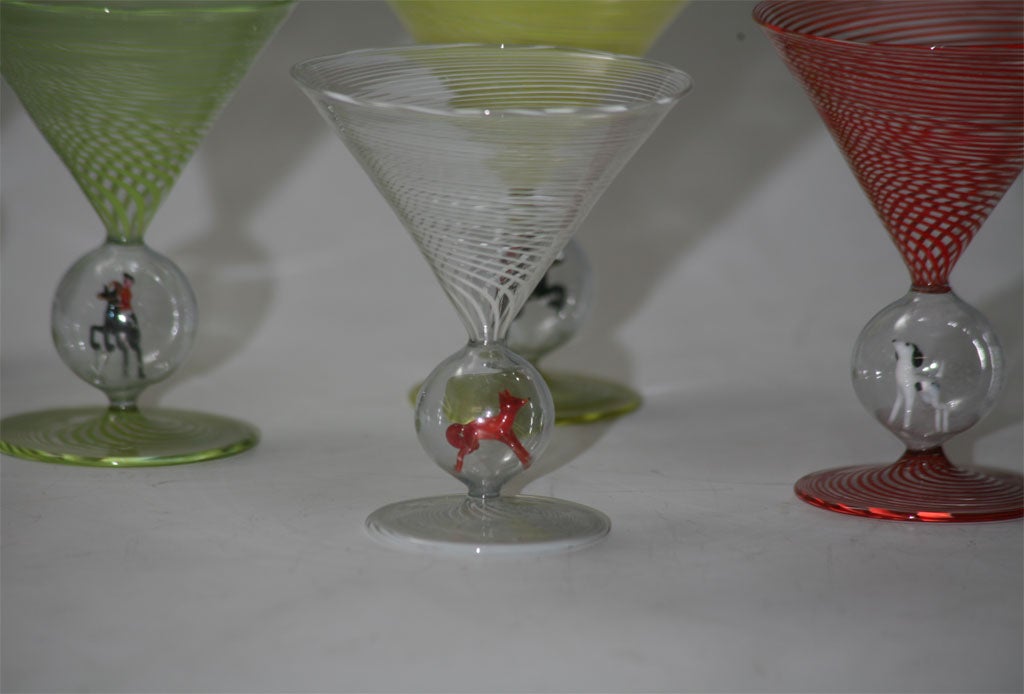 A rare set of 6 hand blown multi-colored martini glasses with figural hunt figures in the crystal ball connectors, including the elusive fox!