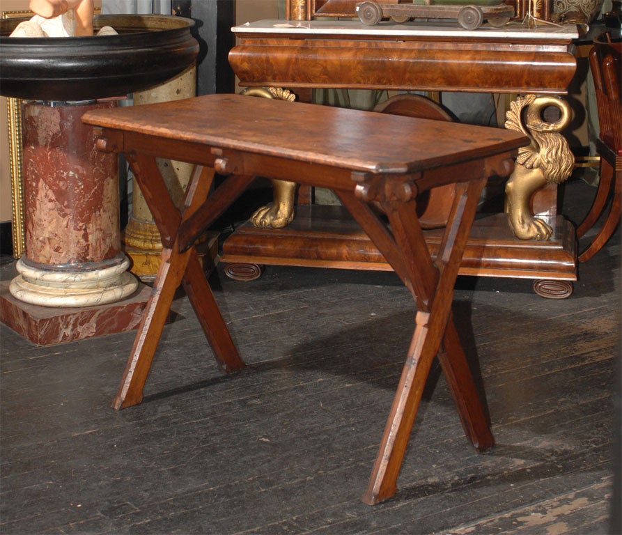 A tall pine table exemplifying the Northern California offshoot of the Arts and Crafts Movement attributed to Bernard Maybeck. <br />
<br />
The 1