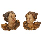 Pair of Carved Putti Heads