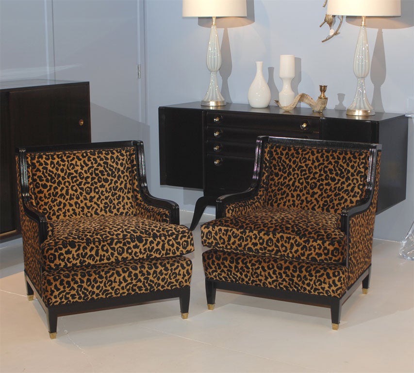 French club chairs refinished in ebony lacquer with brass sabots. Newly upholstered in a velvet leopard print, very chic. Price reduced from $10,500.00 to Net $7500.00 our cost.