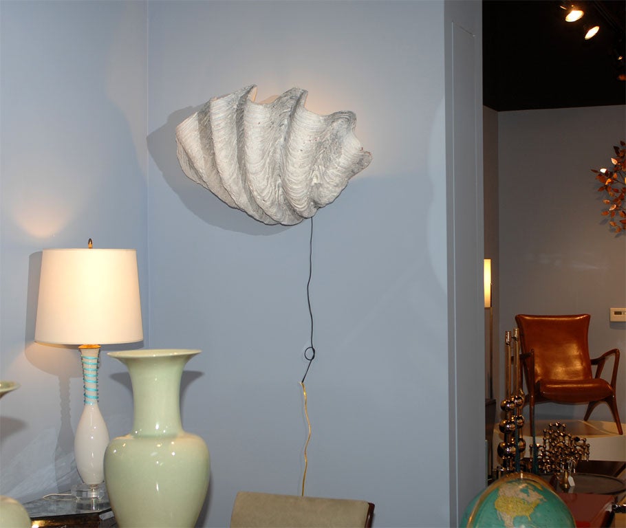 Pair of faux finish clam shell wall sconces. Very well done clam shell wall sconces from a 1950's seafood resturaunt. Net price $2400.00 previously $3600.00