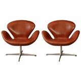 Pair of Brown Leather Arne Jacobsen Swan Chairs