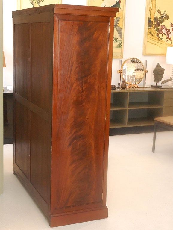 A Flame Mahogany And Gilt Gentleman's Wardrobe Signed Jansen In Good Condition In Palm Desert, CA