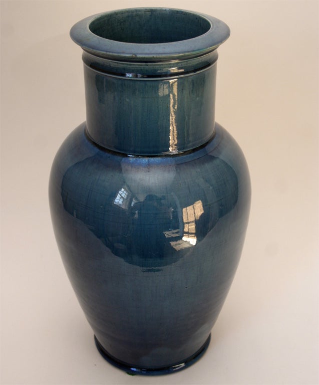 Large hand-thrown Scottish Dunmore Pottery vase with two tone translucent blue glaze. Clean and strong baluster form with segmented lip, neck, and foot. Impressed 