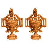 A Pair of Neoclassical Parcel Gilt Urns