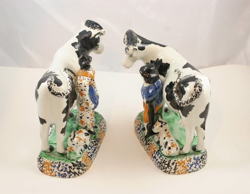 A Pair Of English Pearlware Cow Groups