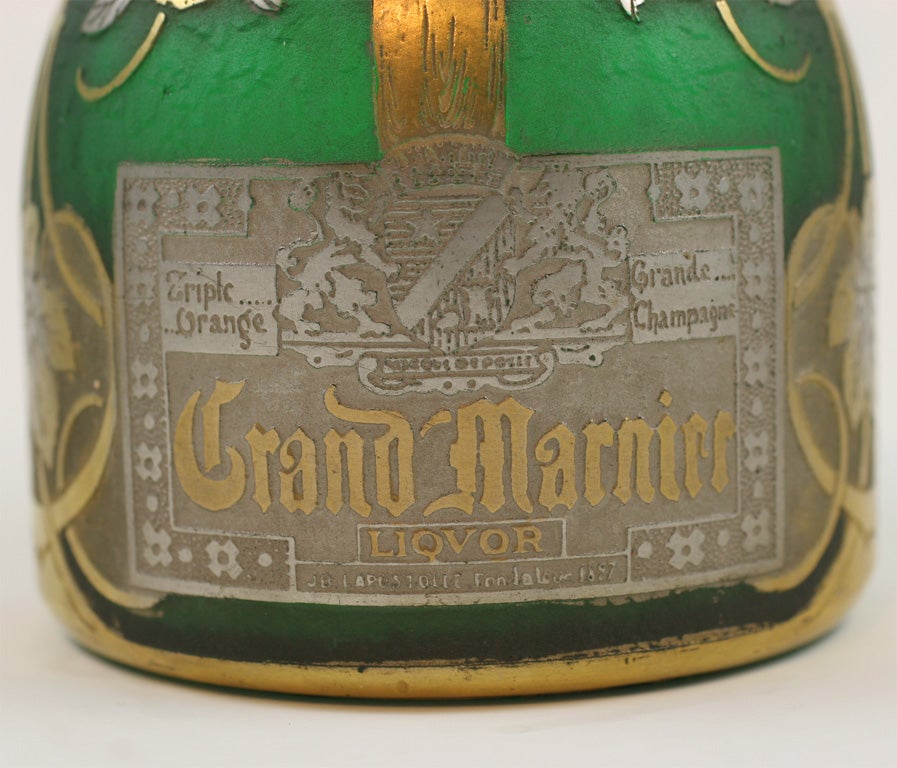 A fine French cameo glass and silver and gold gilt Grand Marnier bottle,attributed to Daum Nancy