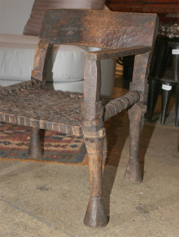 One-armed Ethiopian Chairs with Leather Woven Seats In Good Condition In New York, NY