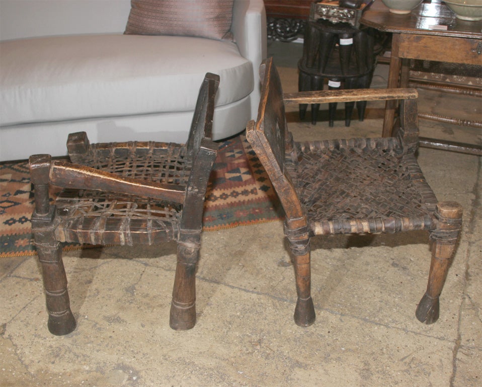 One-armed Ethiopian Chairs with Leather Woven Seats 3