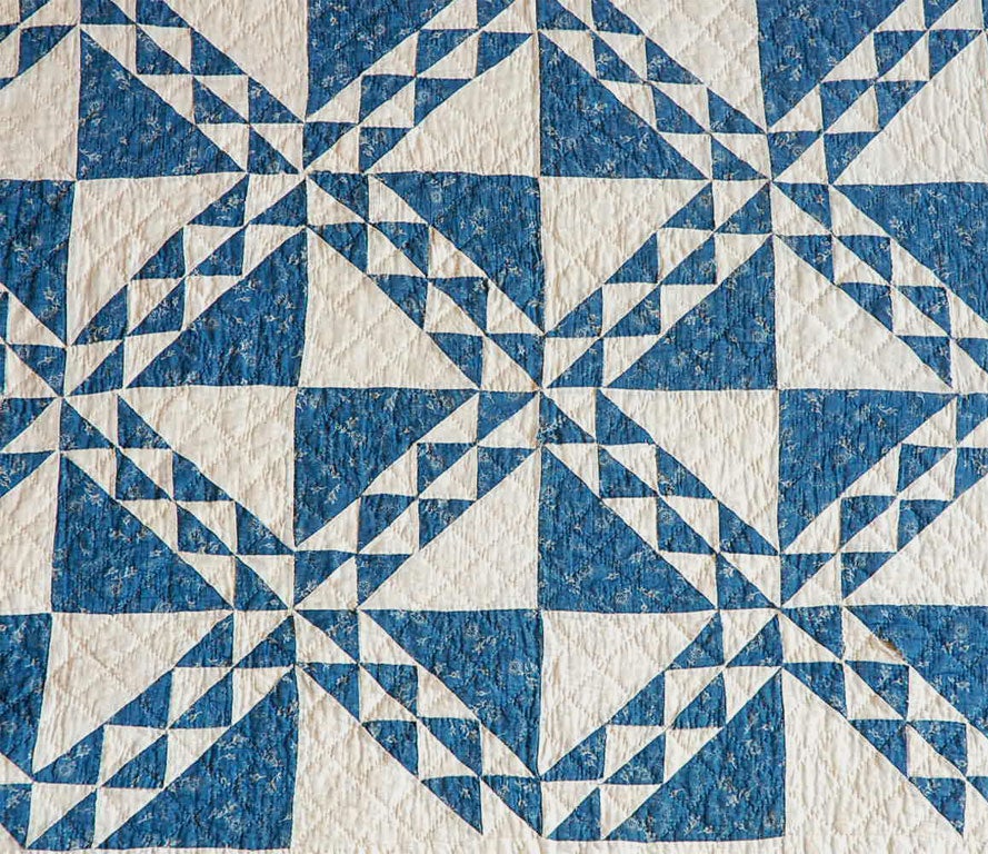 American 19TH  CENTURY BLUE AND WHITE CALICO OCEAN WAVES QUILT