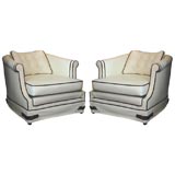 Pair of Vintage White Vinyl Regency Lounge Chairs