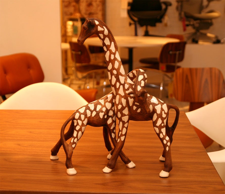 Charming pair of Giraffes intertwined.  Located at Las Venus 163 Ludlow St. 212-982-0608.