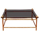 FAUX BAMBOO BRASS COFFEE TABLE WITH BLACK GLASS TOP