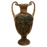 Tole painted urn with holly motif