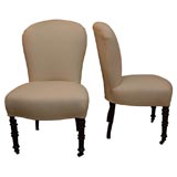 Pair of Side Chairs with turned feet legs and with castors