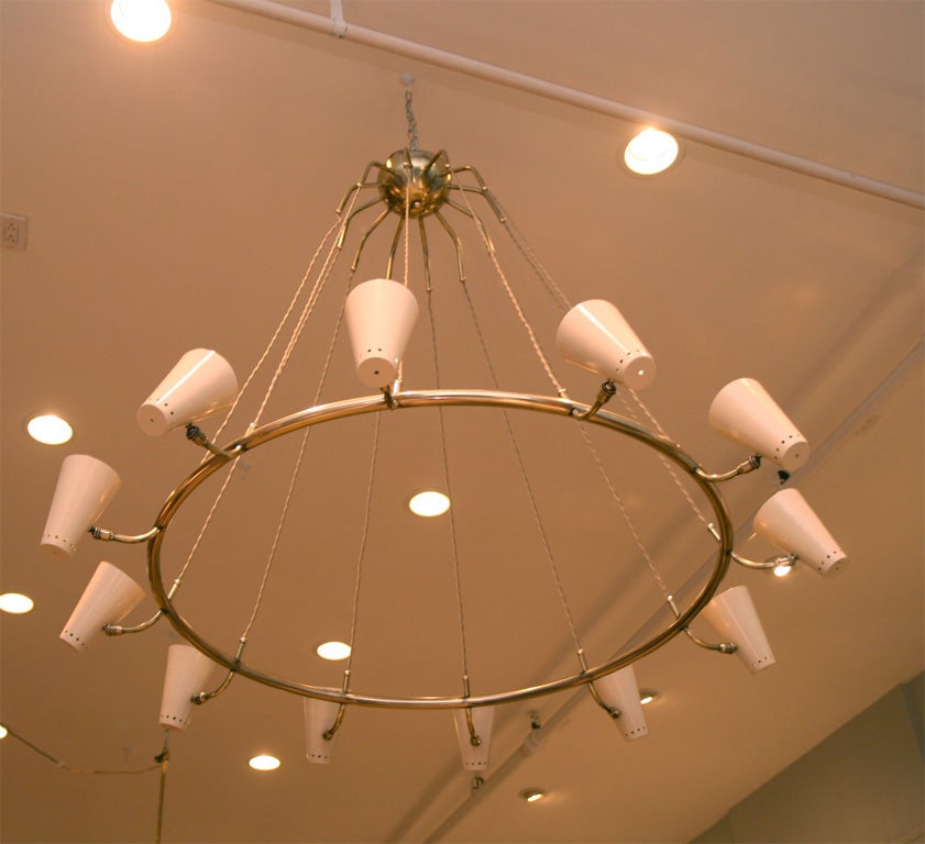 Elegant twelve lights chandelier, all the shades can be rotated in any direction.