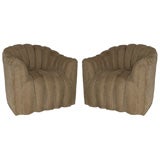 A Pair of Swivel Club Chairs