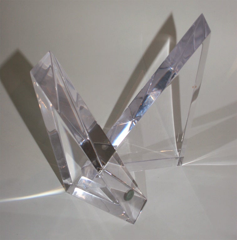Beautiful Lucite Sculptures, sold as a pair or separately. The taller, right-angle piece is 13.5