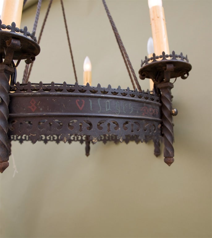 Finely detailed chandelier with early French/Latin writing.  Originally a gas chandelier.
