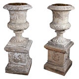 Pair of Scottish terracotta urns on bases