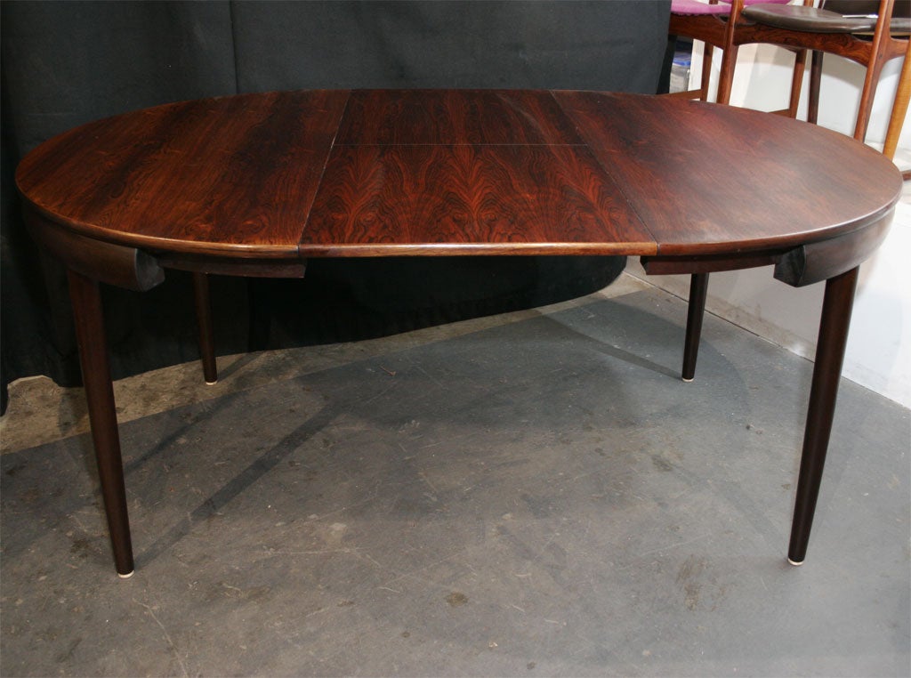 Mid-20th Century Rosewood Dining Table with Nested Chairs by Hans Olsen