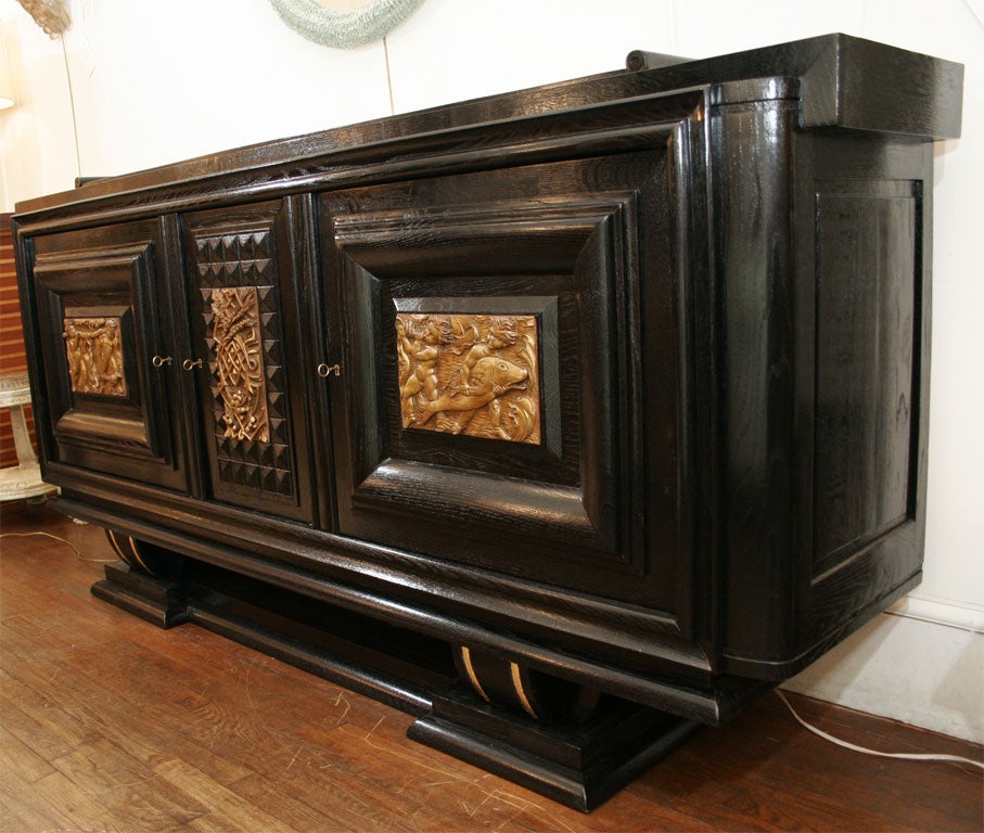 A black side board, James Mont