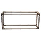 Large scale faux Bamboo console with polished aluminum mounts