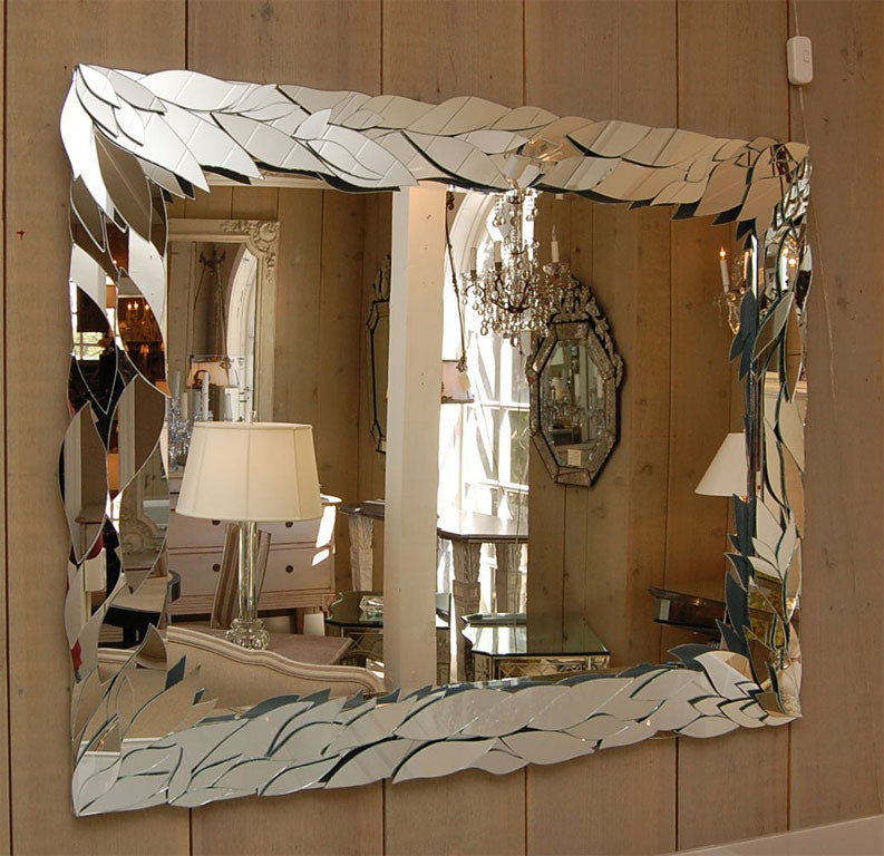 Beautiful contemporary mirror with extensive mirror leaf overlay - a hand made one-of-a-kind piece which can be commissioned in custom sizes.