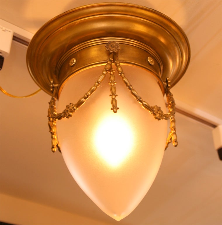 A Pair of American Neo Classic Design Bronze Light Fixtures